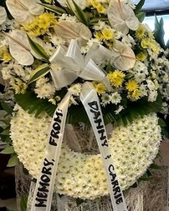 elegant yellow and white funeral standee
